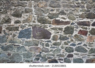 the texture of the stone walls. textured background of the stone walls of the old house. stone walls as backgrounds or textures. part of a stone wall for background or texture