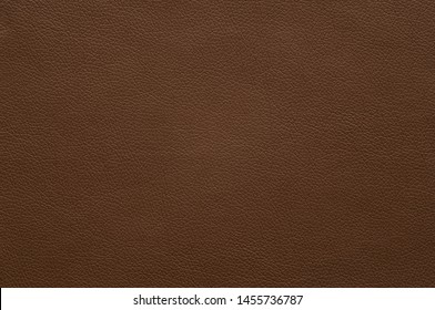 The texture of the surface of artificial leather brown. - Shutterstock ID 1455736787