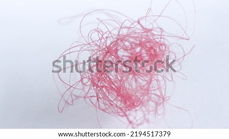 texture of tangled kite ball isolated on white background. copy space. close up. abstract background.