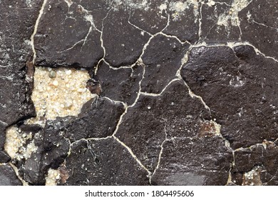 Texture Of A Tar Mat On A Beach From An Oil Spill In Brittany, France. 