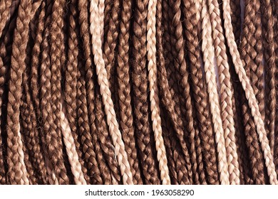 Texture Of Thin Brown African Braids, Hair Close-up Braided In Pigtails Dreadlocks, Afro Style