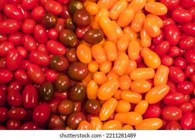 Texture Of Tomatoes In Basket At The Market Place. Long Plum Tomato Texture Background. Fresh Small Red And Yellow Cherry Tomatoes Pattern, Mini Organic Cocktail Tomate Mix Wallpaper Top View