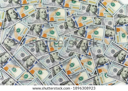 Texture US dollars. Background of one hundred dollar bills.