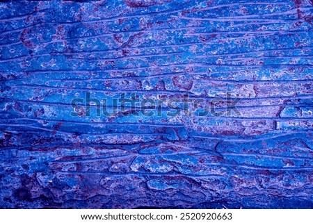 Texture. Wall. Background with cracks and rough surface. Wall texture backdrop. Abstract navy blue color wallpaper textured cement panel with horizontal lines and grooves. Uneven, jagged 