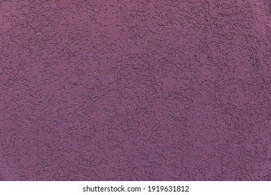 The Texture Of The Wall Is Dark Mauve Color