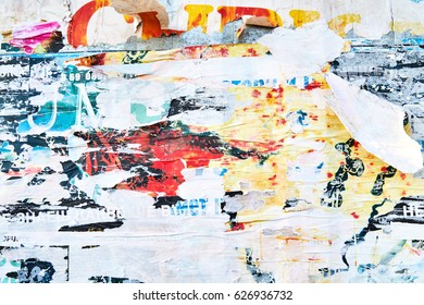 The texture of a wall with torn posters and ads. Bright abstract background ideal for any design                                - Shutterstock ID 626936732