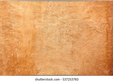 Texture Walls Covered With Brown Plaster.close Up. Wall Traditional Arab Houses Covered With Wild Brown Plaster Applied By Hand