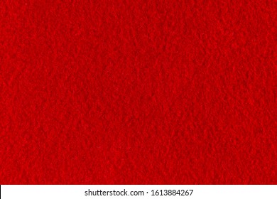 Texture Of Warm Red Fleece Blanket, Soft Pile Fabric For Home Comfort. Free Space For Text. Bright Festive Background