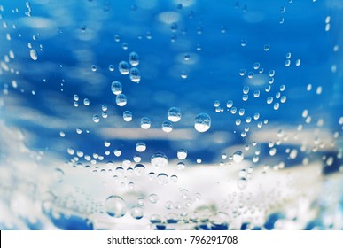 The Texture Of Water Is Carbonated. Water Is Macro. Background And Space For Your Text. 