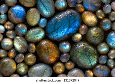 Texture of wet colorful labradorite gem stones. - Powered by Shutterstock