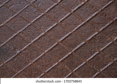 Texture Of Wet Old Rusty Waffle Iron