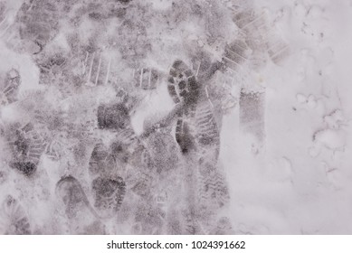 texture of wet snow on which many prints from shoes