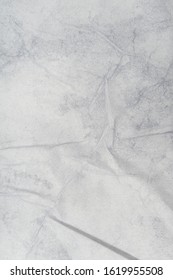 Texture Of Wet White Folded Paper On An Outdoor Poster Wall, Crumpled Paper Background. - Image