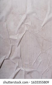 Texture Of Wet White Folded Paper On An Outdoor Poster Wall, Crumpled Paper Background. - Image