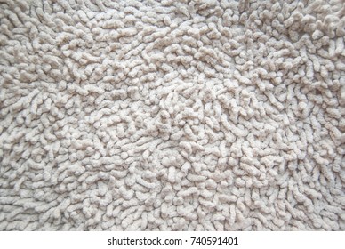 Texture Of A White Carpet With A Fringe