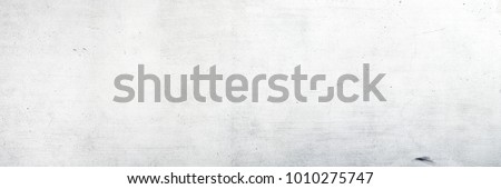 Texture of a white concrete wall for background