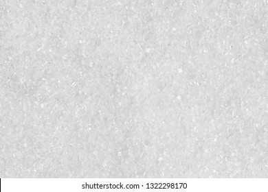 Texture of white refined sugar. macro photography. Sugar crystals closeup. Abstract white background. You can place your text.