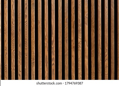 Texture Of Wood Lath Wall Background. Seamless Pattern Of Modern Wall Paneling With Vertical Wooden Slats For Background