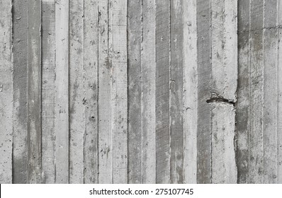 Texture Of Wooden Formwork Stamped On A Raw Concrete Wall As Background  