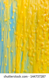 Texture Of Yellow Candle Wax Stains On Blue Plastic