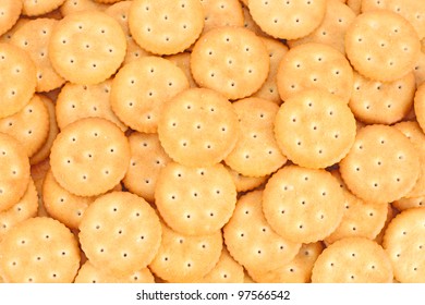 The texture of the yellow round crackers background