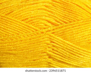 The texture of yellow wool blend yarn. Warm wool blend yarn close-up. - Shutterstock ID 2396511871
