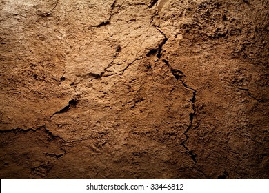 Textured background    dry cracked brown earth