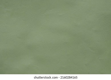Textured background made of light green kraft paper. Background with the texture of plain khaki paper. green retro paper background. Vintage cardboard texture. Grunge-style drawing paper. - Shutterstock ID 2160284165