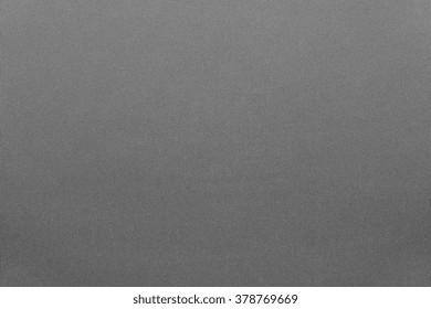 the textured background from textile material or from fabric of gray color with abstract design of texture