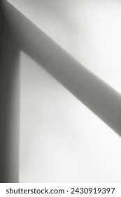 Textured Background, Wall with shadow, windowframe, sunlight shining onto the wall, casting a shadow