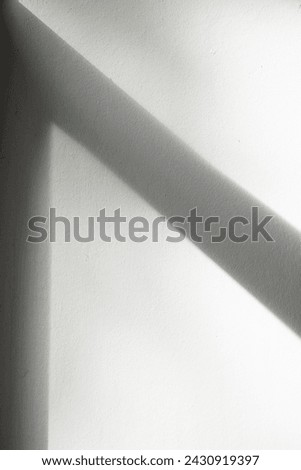 Textured Background, Wall with shadow, windowframe, sunlight shining onto the wall, casting a shadow
