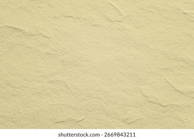 Textured beige background with a subtle, sandy feel. The beige color gives the background a warm, earthy tone, perfect for natural designs. Beige textured background with copy space.