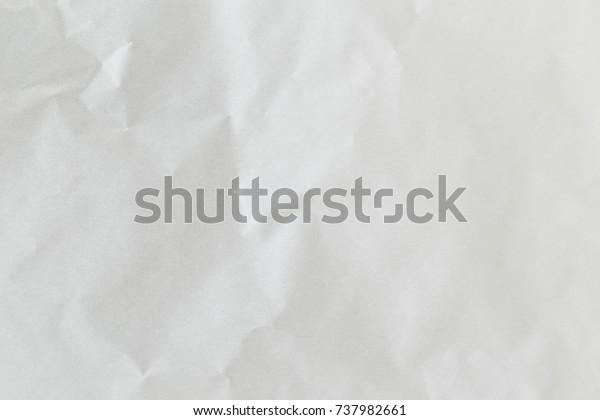 Textured blank\
crumpled paper of white\
color