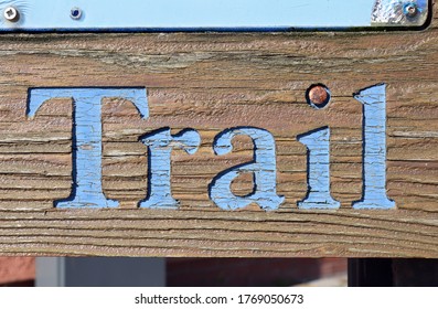 Textured Carved Wooden Sign 'Trail'  With Blue Painted Letters
