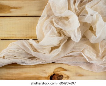 Textured Cheese Cloth On A Wooden Box