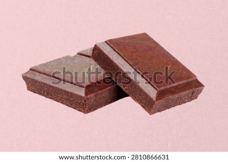 Textured chocolate cubes in Risograph style. Vintage print effect with a grain texture for food, packaging, branding and creative design