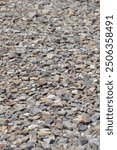 Textured Close-Up of Colorful Gravel Stones, Showcasing a Variety of Natural Colors and Shapes, Ideal for Landscaping, Construction, and Decorative Purposes in Outdoor Settings