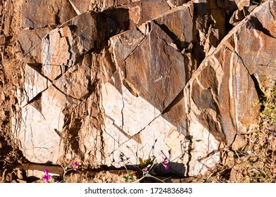 Textured Fragment Of A Granite Rock With A Geometric Contrasting Pattern