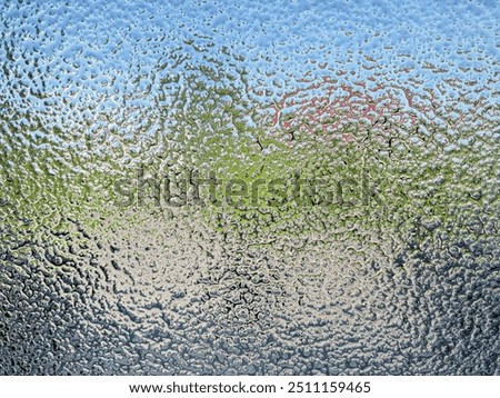 Textured glass reflection and refraction effect in rippled random ripple dots pattern. Also called rippled glass texture for the texturized uneven refraction and transparency.