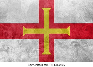 Textured photo of the flag of Bailiwick of Guernsey.