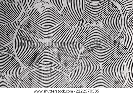 textured plaster for walls, patterns in the form of rings. The texture is black and white