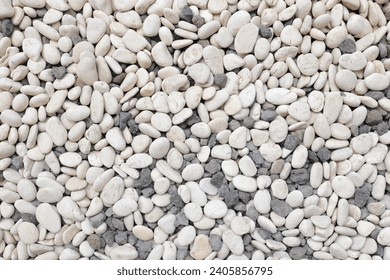 Textured rock pile on gravel ground, full of pebbles. Gravel background - Powered by Shutterstock