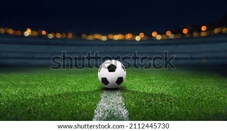 textured soccer game field with neon fog - center, midfield - 3d illustration