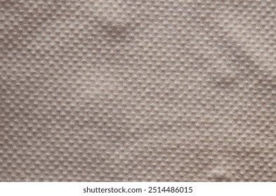 The textured surface of the paper, with its intricate pattern of raised dots, evokes a sense of tactile appeal and depth.