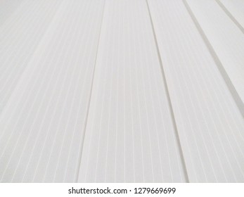 Textured surface of vertical blinds. Close up