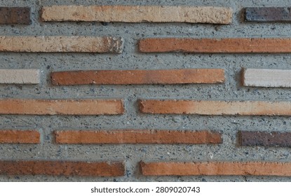 Textured wall background with horizontal brick and mortar bands – Detailed view of a rustic background