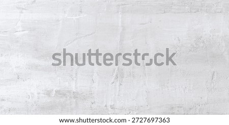 Textured white plaster wall background. White plaster surface with texture. Ideal for backgrounds, textures, and design. Plaster wall with a textured finish. Background with copy space.