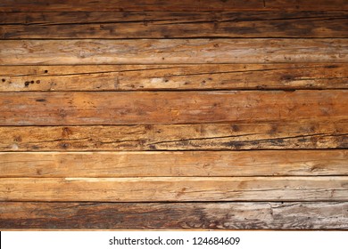 Textured Wood On A Mountain Cabin Facade