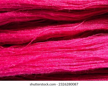 textured yarn for weaving dark pink - Shutterstock ID 2326280087