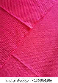 Textures and patterns of pink tablecloths